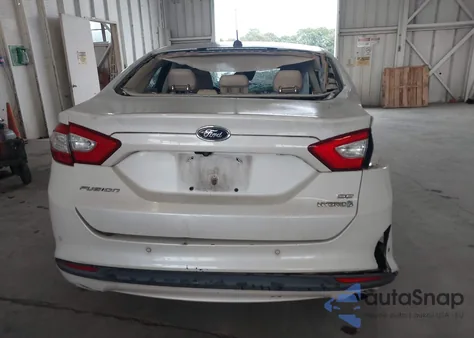 2013 Ford Fusion Hybrid Se z USA, uszkodzony, nr VIN 3FA6P0LU8DR357054